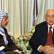 Arafat and Sharon share an awkward moment.